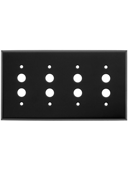 Classic Four Gang Push Button Switch Plate In Matte Black.